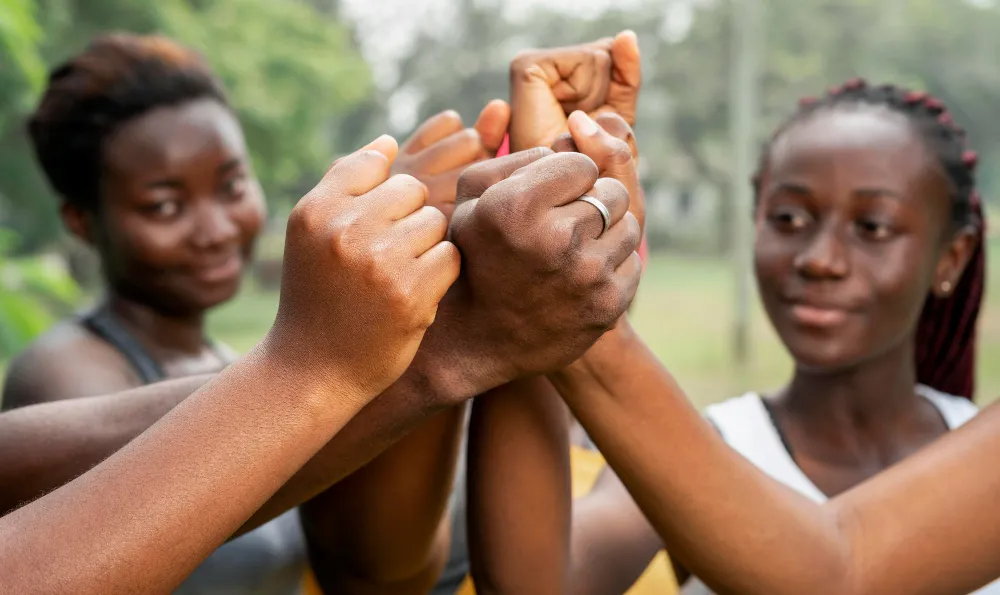close up team hand shake